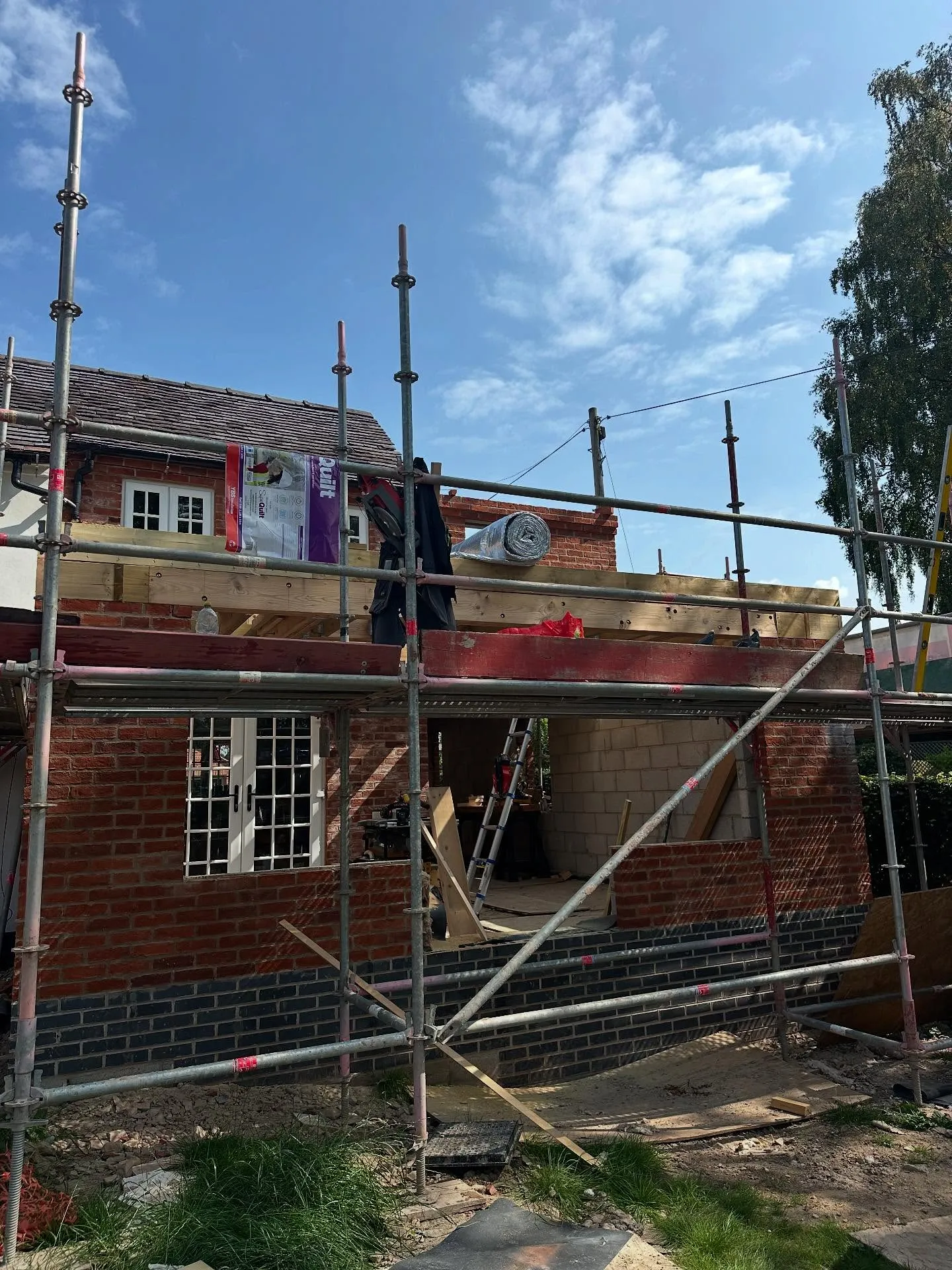 Scaffolding around a building during construction